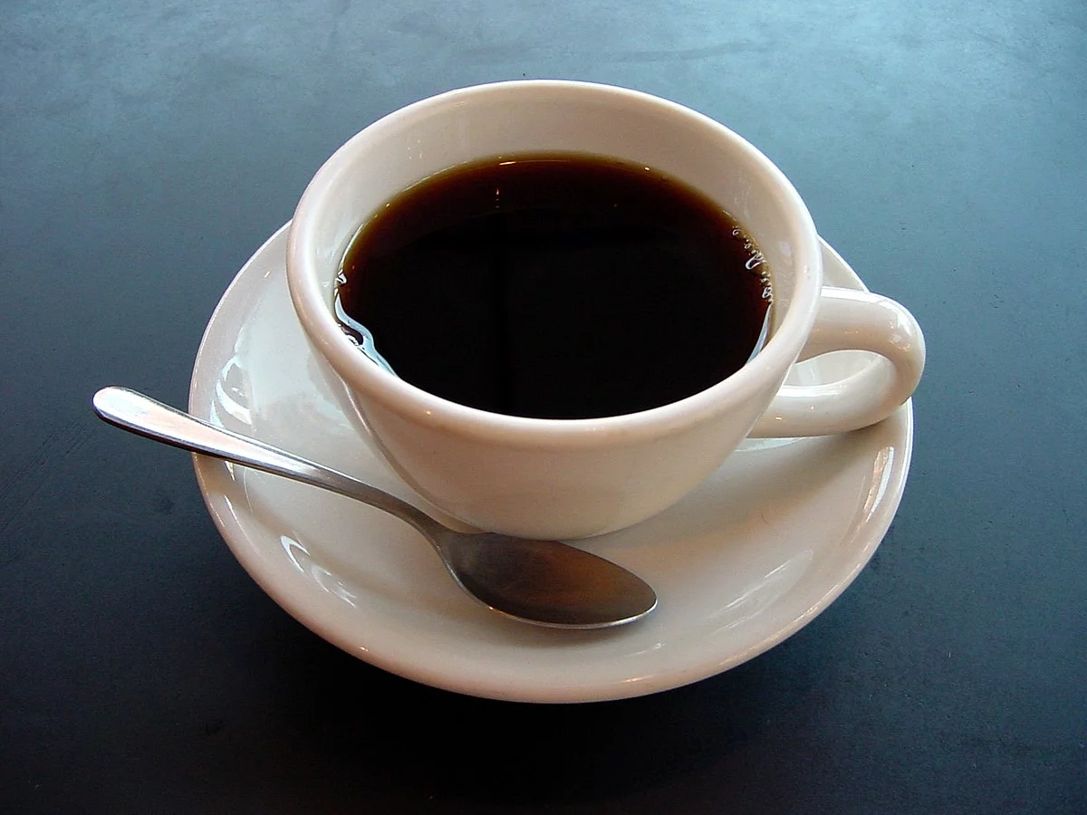 1200px-A_small_cup_of_coffee.webp