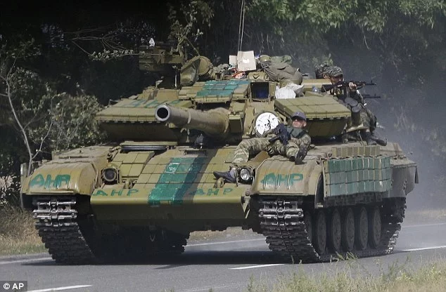 1409836595065_wps_4_Pro_Russian_rebels_ride_o.webp