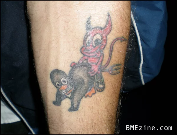 20081114-bsd-vs-linux-tattoo.webp