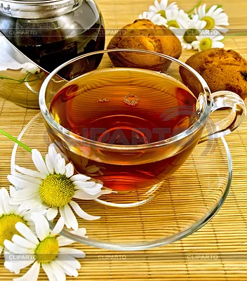 3742798-herbal-tea-with-daisies-and-kettle.webp