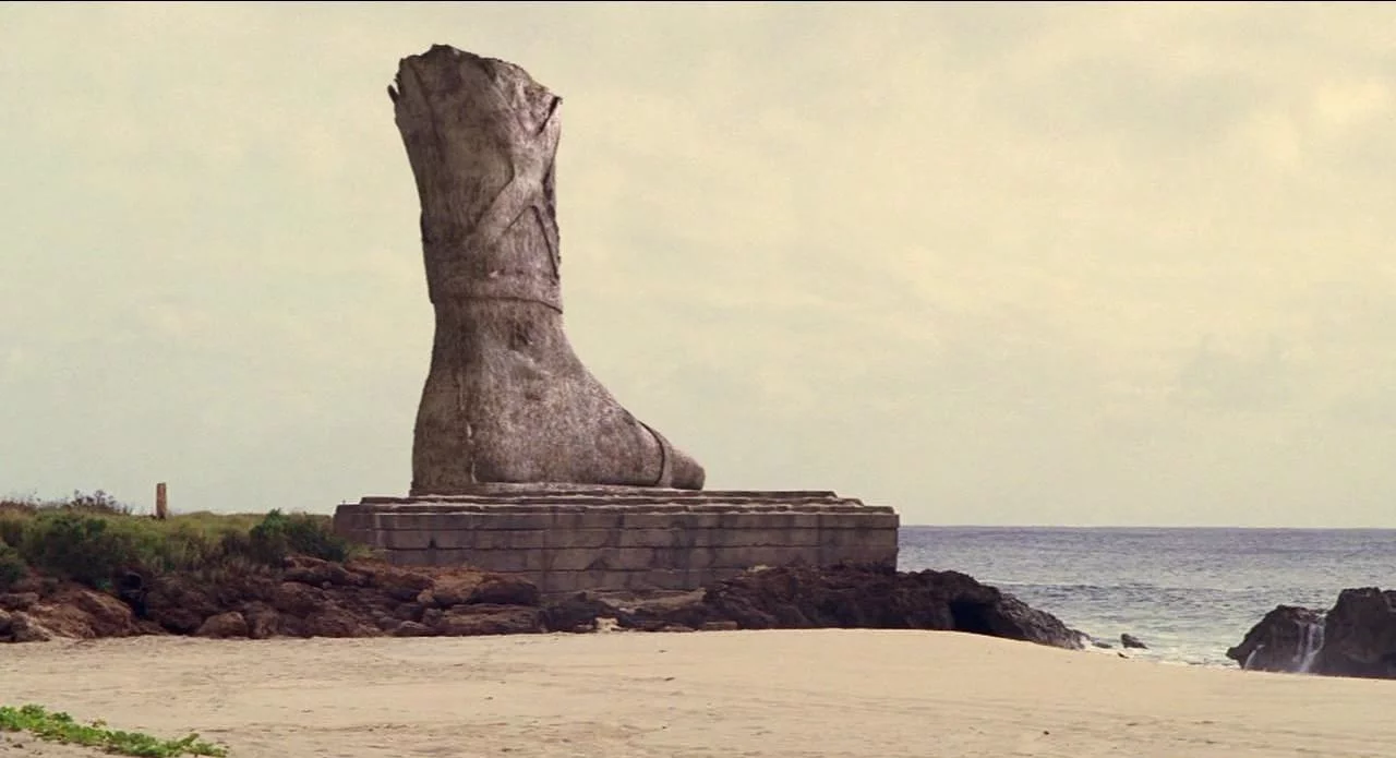 5x16_Statue_ruins.webp