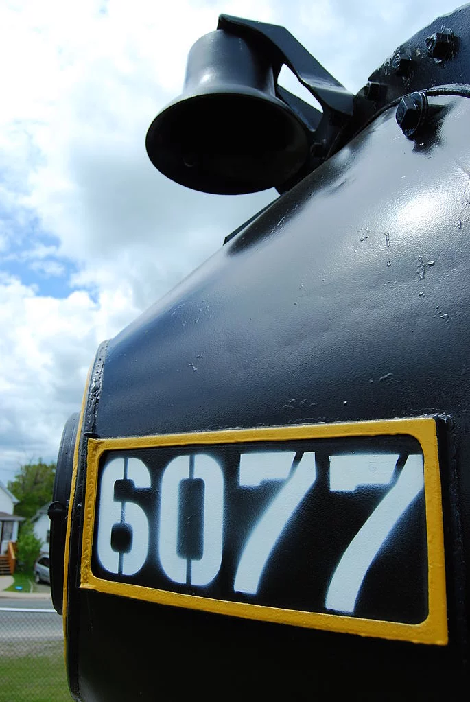 685px-6077_with_bell.webp
