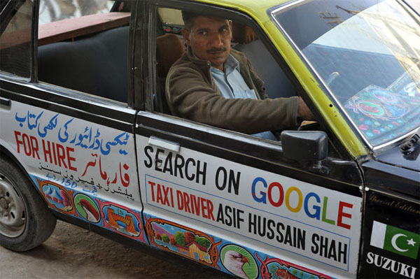 Asif-hussain-Shah-with-his-Taxi.jpg