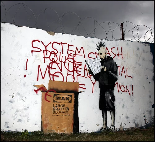 Banksy_large_graffiti_slogan.webp