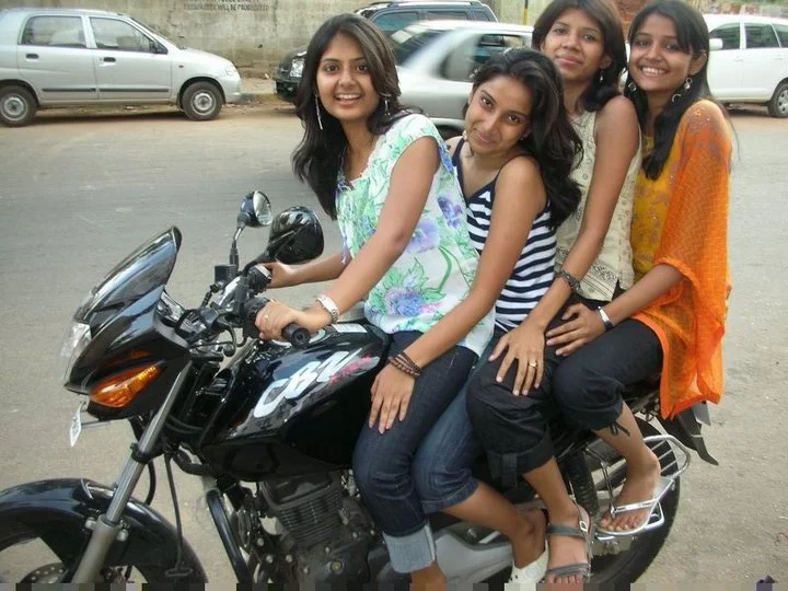 cute_indian_girls_on_bike-normal.webp