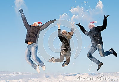 happy-people-jumping-winter-17379616.jpg