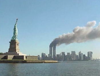 l_Park_Service_9-11_Statue_of_Liberty_and_WTC_fire.jpg