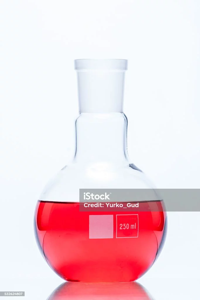 sistant-flask-with-blue-liquid-picture-id532624807.webp