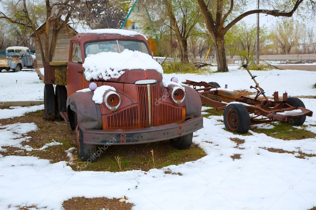 -Snow-old-truck-in-the-early-spring-time-in-Nevada.webp