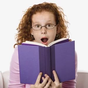 surprised-girl-reading-book.webp