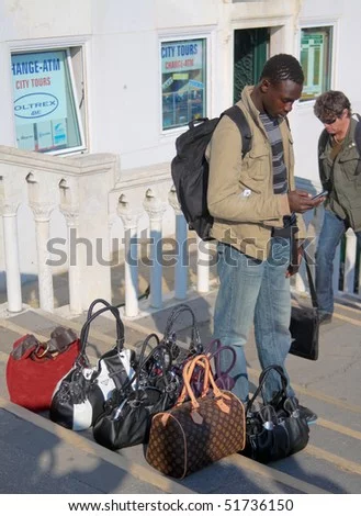 th-fake-leather-bags-on-october-in-venice-51736150.webp