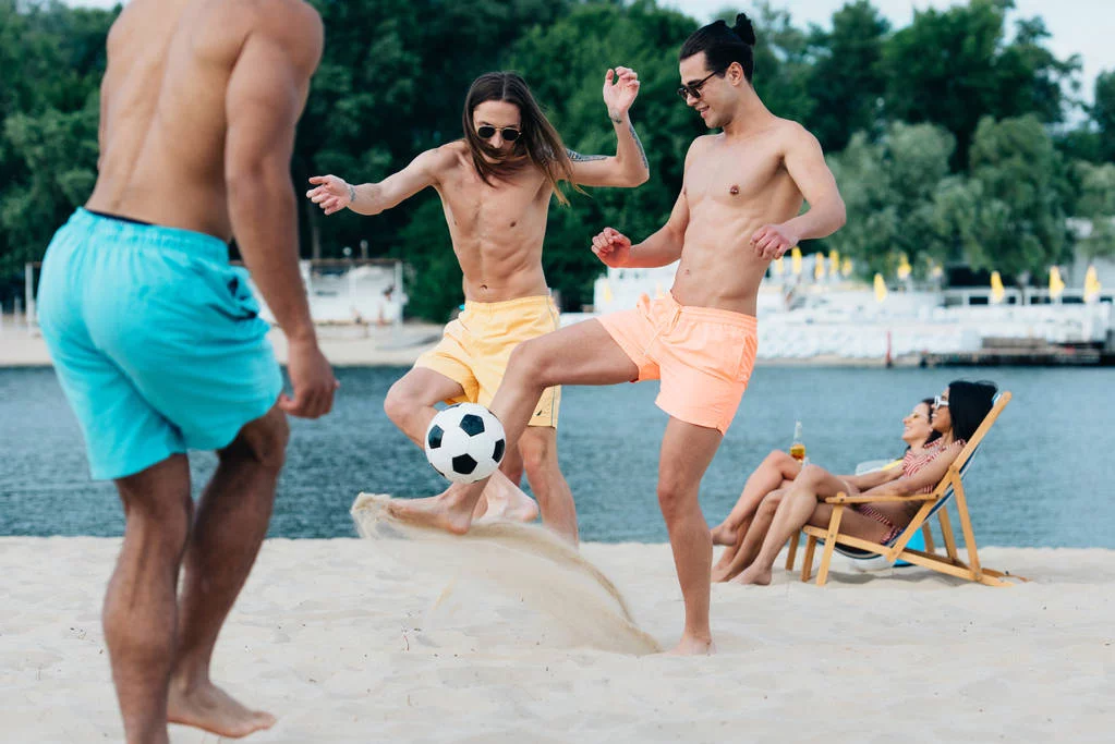 tock-photo-excited-young-multicultural-men-playing.webp