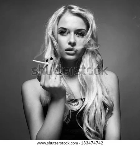 trait-of-a-beautiful-lady-with-cigarette-133474742.webp