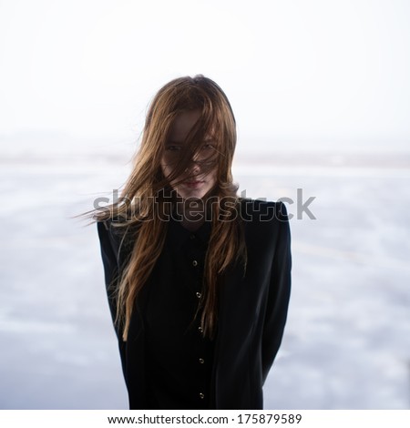 utiful-girl-in-a-black-coat-photo-gothic-175879589.jpg