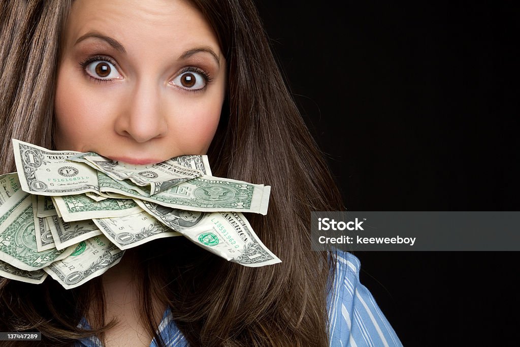 woman-with-money-in-mouth-picture-id137447289.jpg