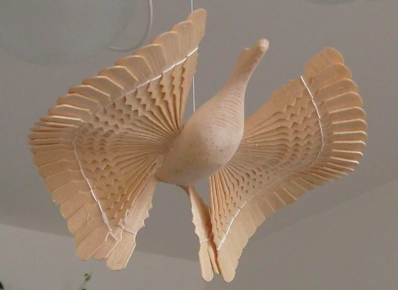 Wooden_bird_of_happiness.webp