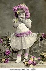 ittle-girl-in-lacy-dress-and-with-flowers-in-81588.jpg