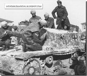 ish-Indian-soldiers-examine-a-captured-german-tank.jpg