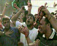 waves-entrails-of-butchered-israeli-victims-in-ramala-300.jpg