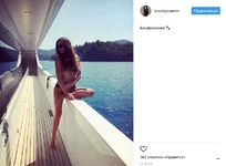 ковалева на яхте.png